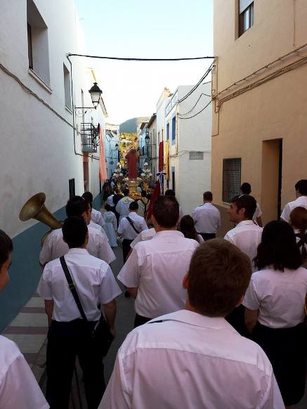 DES DE DARRERE, A LA BANDA: carrer Bisserot, a la processó del Cor de Jesús